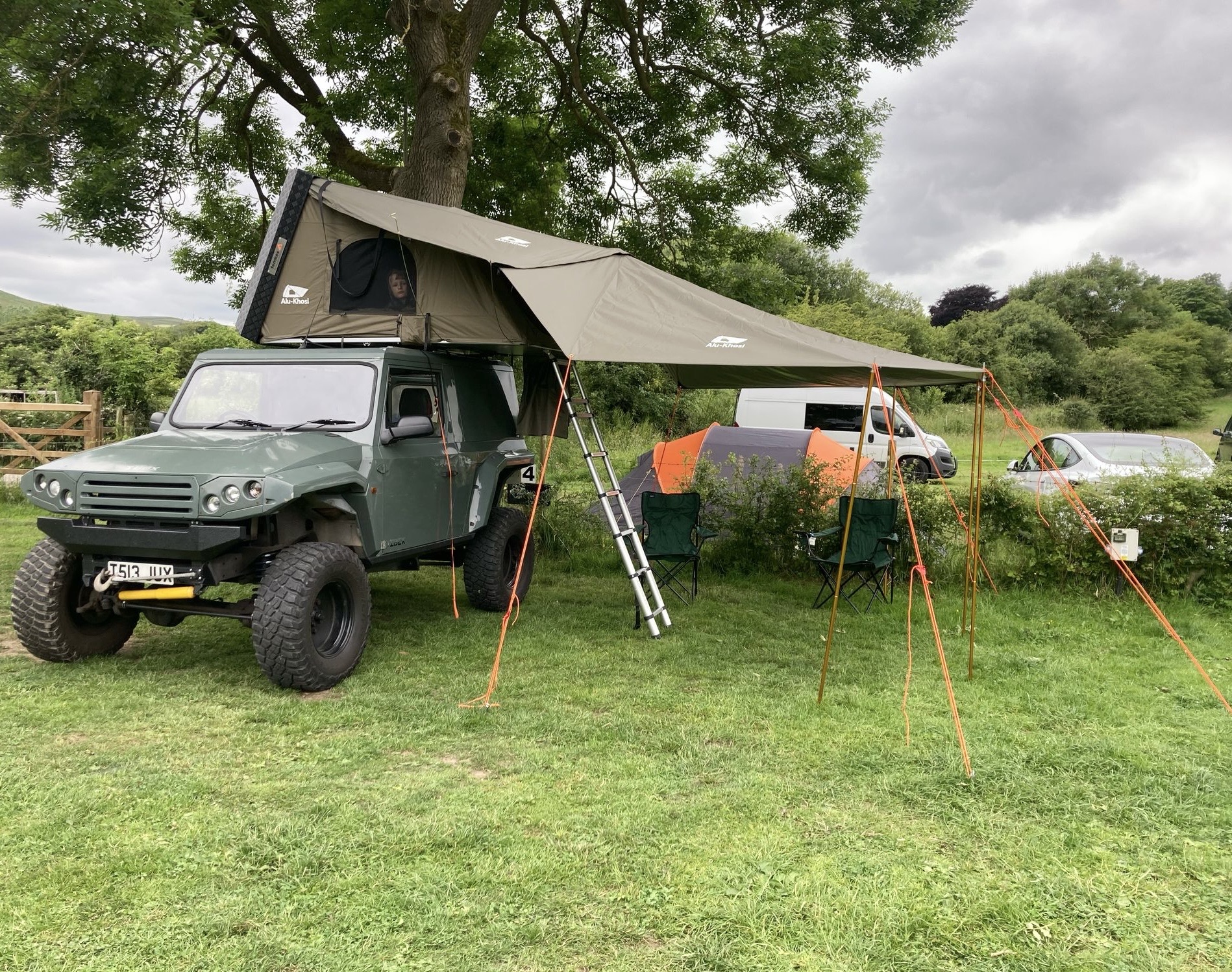 Khaki Green Rooftop Tent on a green Ibex vehicle